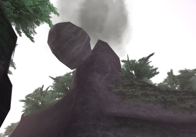 Large rocks fall beside the beach cliffs.